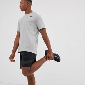 Nike Dri-FIT • Gray Short Sleeved T-shirt.